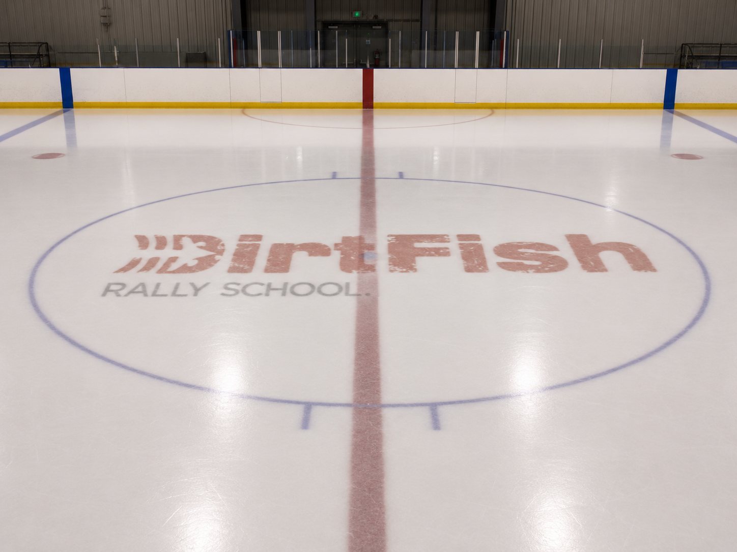 DirtFish Rally School logo embedded under the ice at center rink